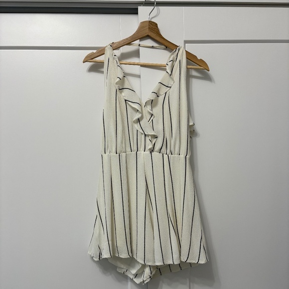 Striped open back ruffled romper - Picture 1 of 7